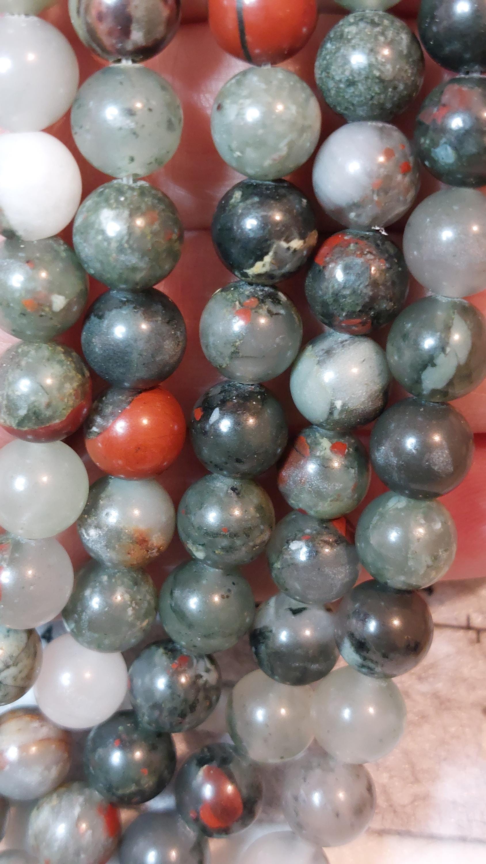 8 mm natural bloodstone beads, 15 inch strand.