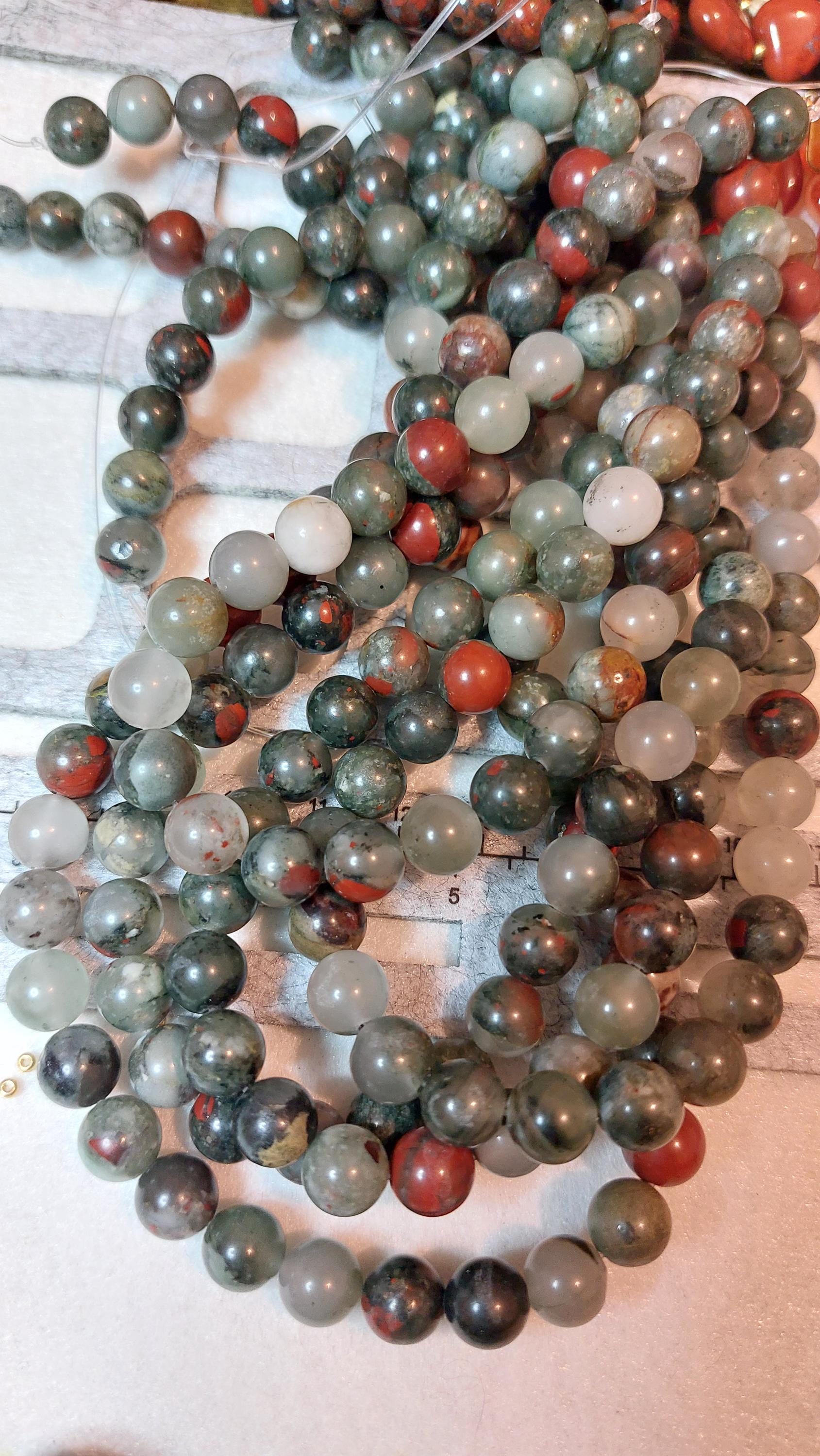8 mm natural bloodstone beads, 15 inch strand.